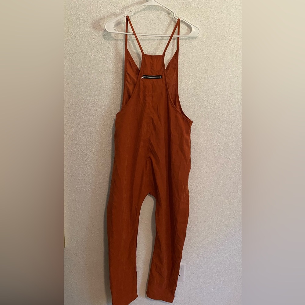 Rust jumpsuit.